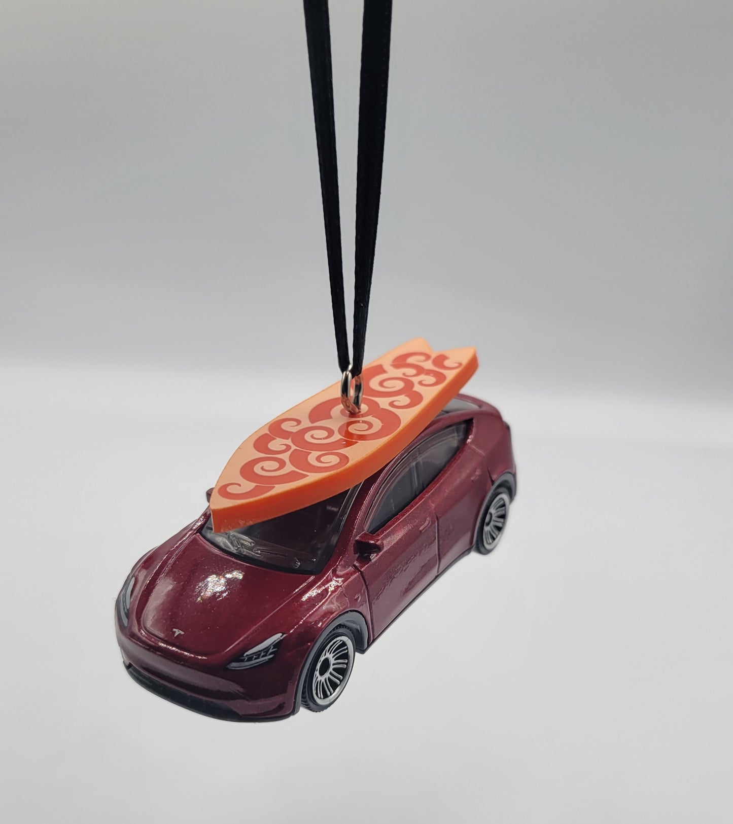Tesla Model Y Red Diecast Christmas Ornament with Surfboard on Roof – Color of Surfboard May Vary – Perfect Holiday Decoration for Car Enthusiasts