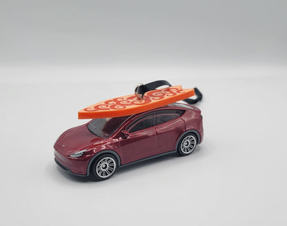 Tesla Model Y Red Diecast Christmas Ornament with Surfboard on Roof – Color of Surfboard May Vary – Perfect Holiday Decoration for Car Enthusiasts