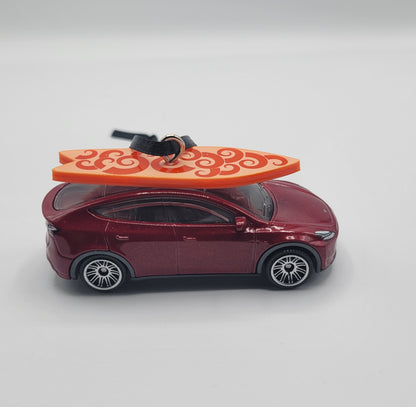 Tesla Model Y Red Diecast Christmas Ornament with Surfboard on Roof – Color of Surfboard May Vary – Perfect Holiday Decoration for Car Enthusiasts