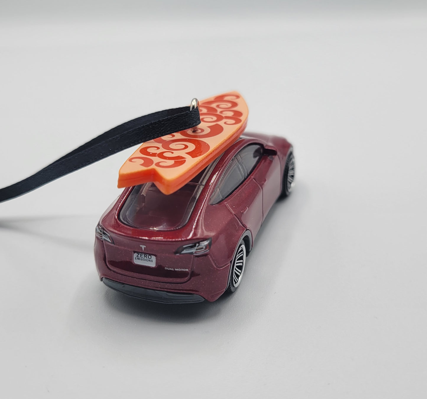 Tesla Model Y Red Diecast Christmas Ornament with Surfboard on Roof – Color of Surfboard May Vary – Perfect Holiday Decoration for Car Enthusiasts