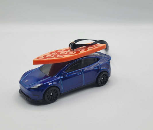 Tesla Model Y Blue Diecast Christmas Ornament with Surfboard on Roof – Color of Surfboard May Vary – Perfect Holiday Decoration for Car Enthusiasts