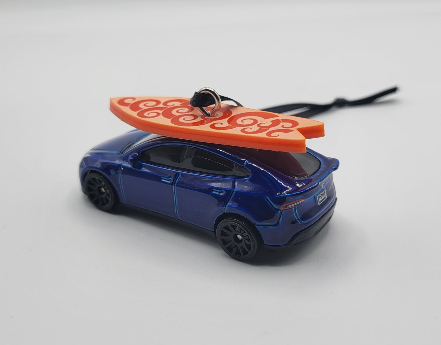 Tesla Model Y Blue Diecast Christmas Ornament with Surfboard on Roof – Color of Surfboard May Vary – Perfect Holiday Decoration for Car Enthusiasts