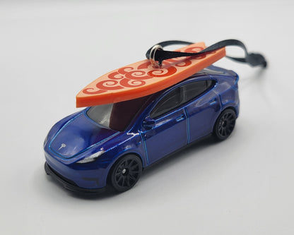 Tesla Model Y Blue Diecast Christmas Ornament with Surfboard on Roof – Color of Surfboard May Vary – Perfect Holiday Decoration for Car Enthusiasts