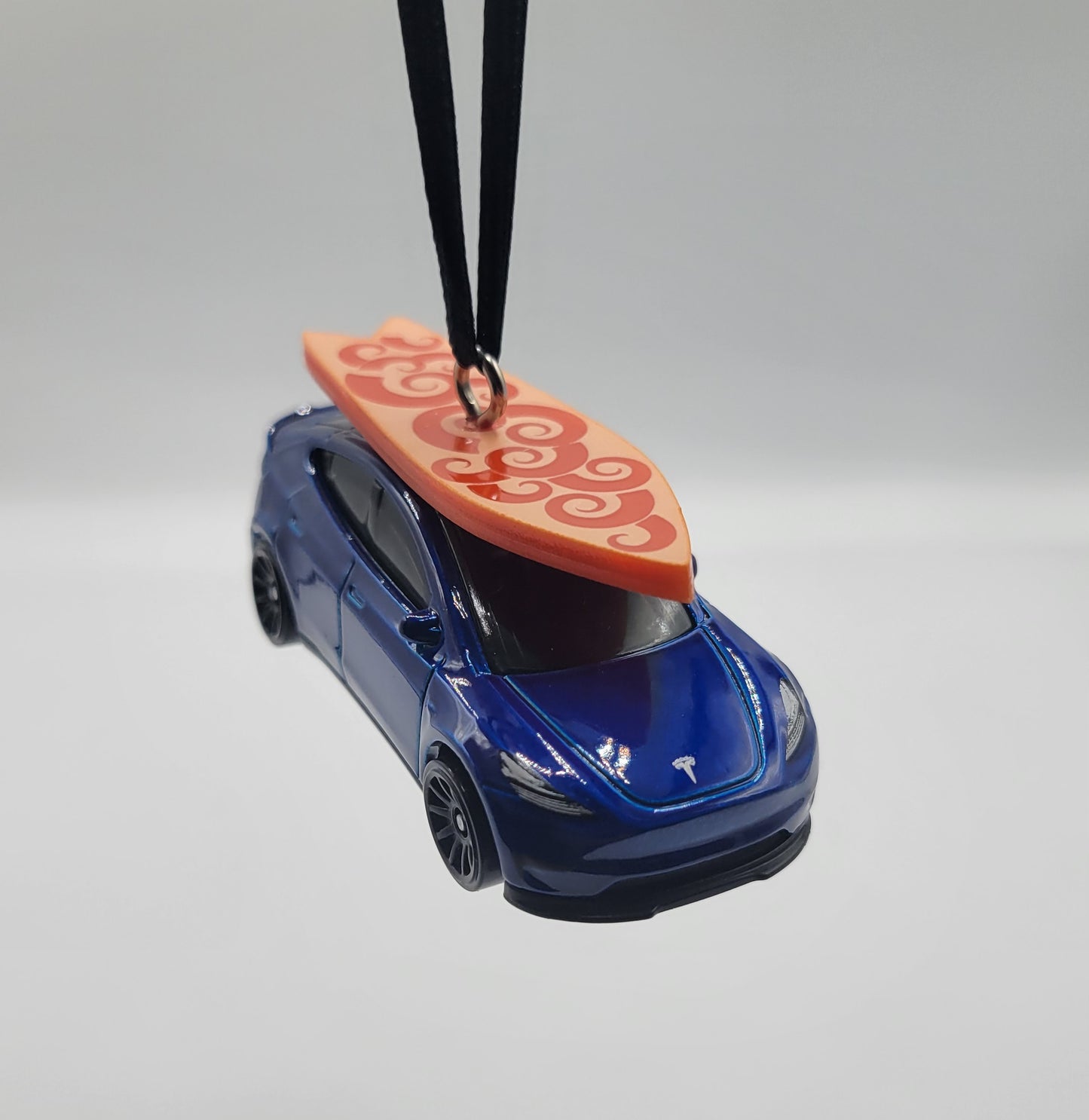 Tesla Model Y Blue Diecast Christmas Ornament with Surfboard on Roof – Color of Surfboard May Vary – Perfect Holiday Decoration for Car Enthusiasts